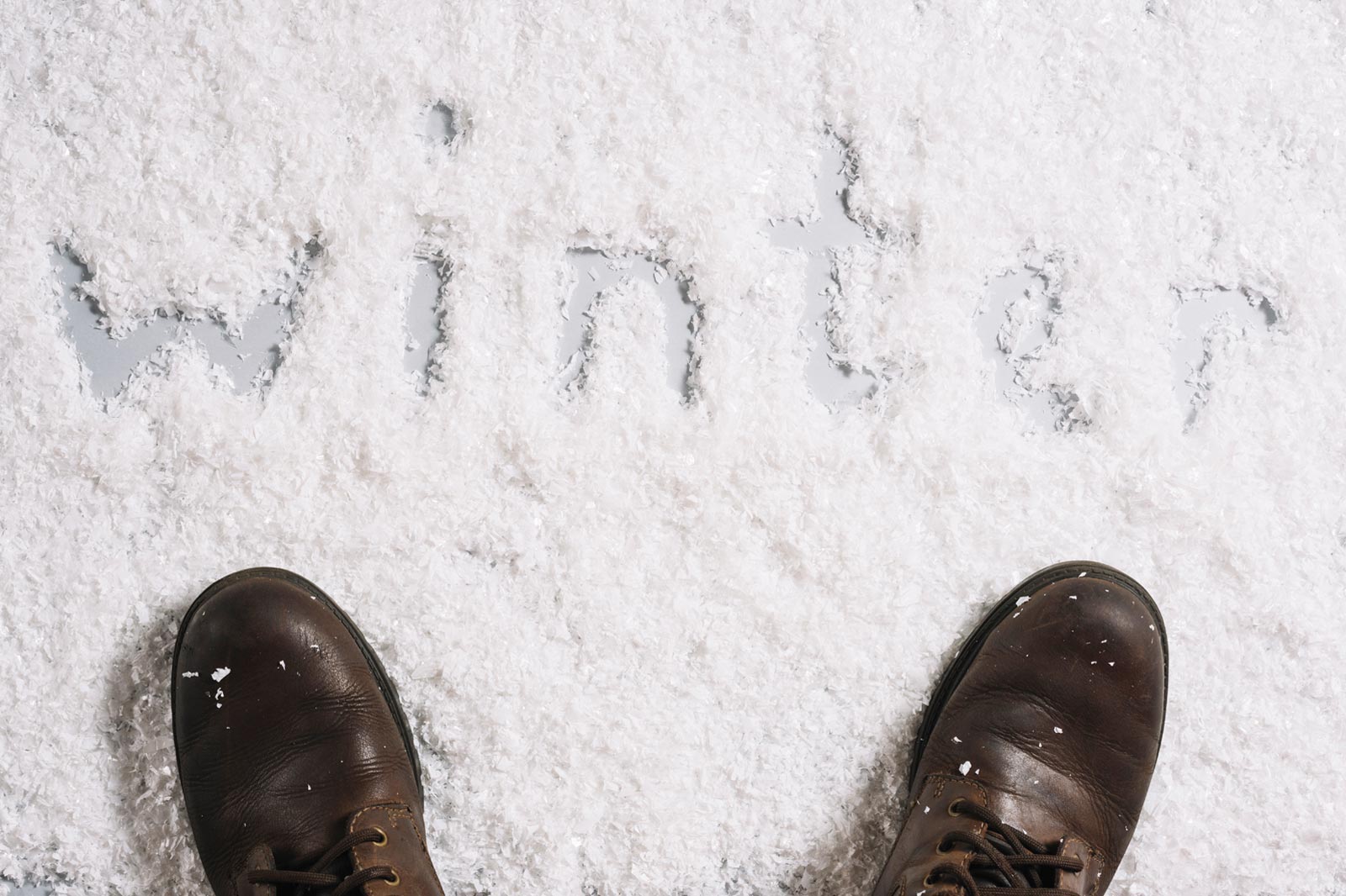 A person stands in the snow