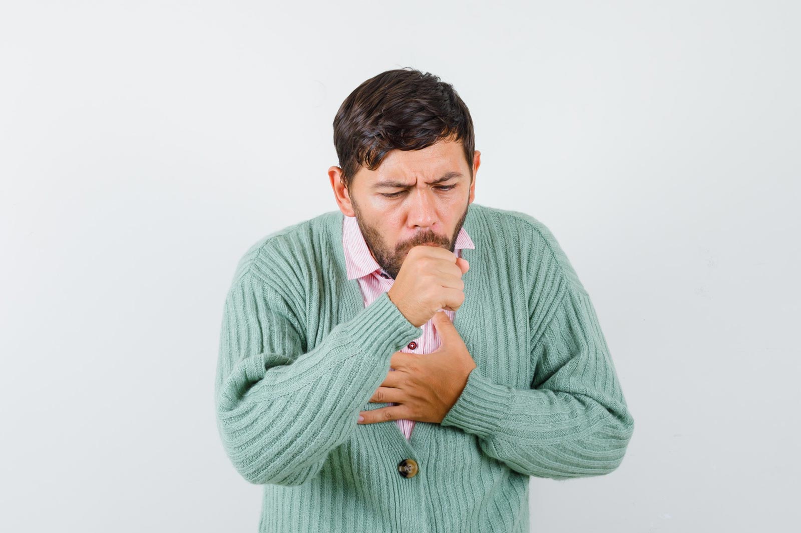 Image of a man coughing