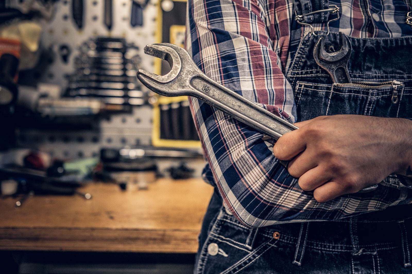 Closeup of a mechanic with wrench